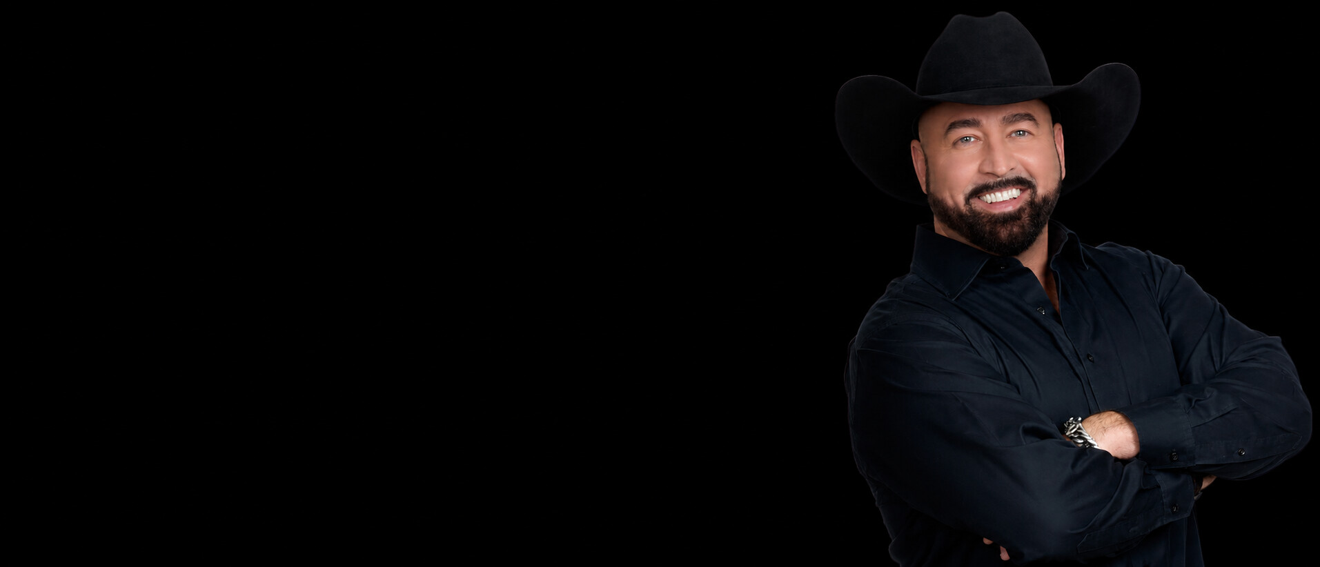 Justin James in a cowboy hat